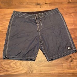 Men’s LG Quicksilver board shorts.